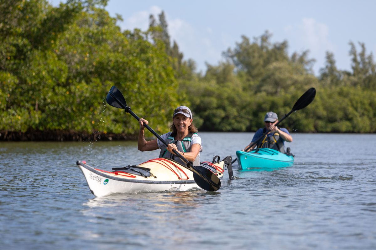 Sea Oaks Vero Beach kayaking Indian River Lagoon mangrove waterways year-round outdoor life — barrier island Florida luxury community water access