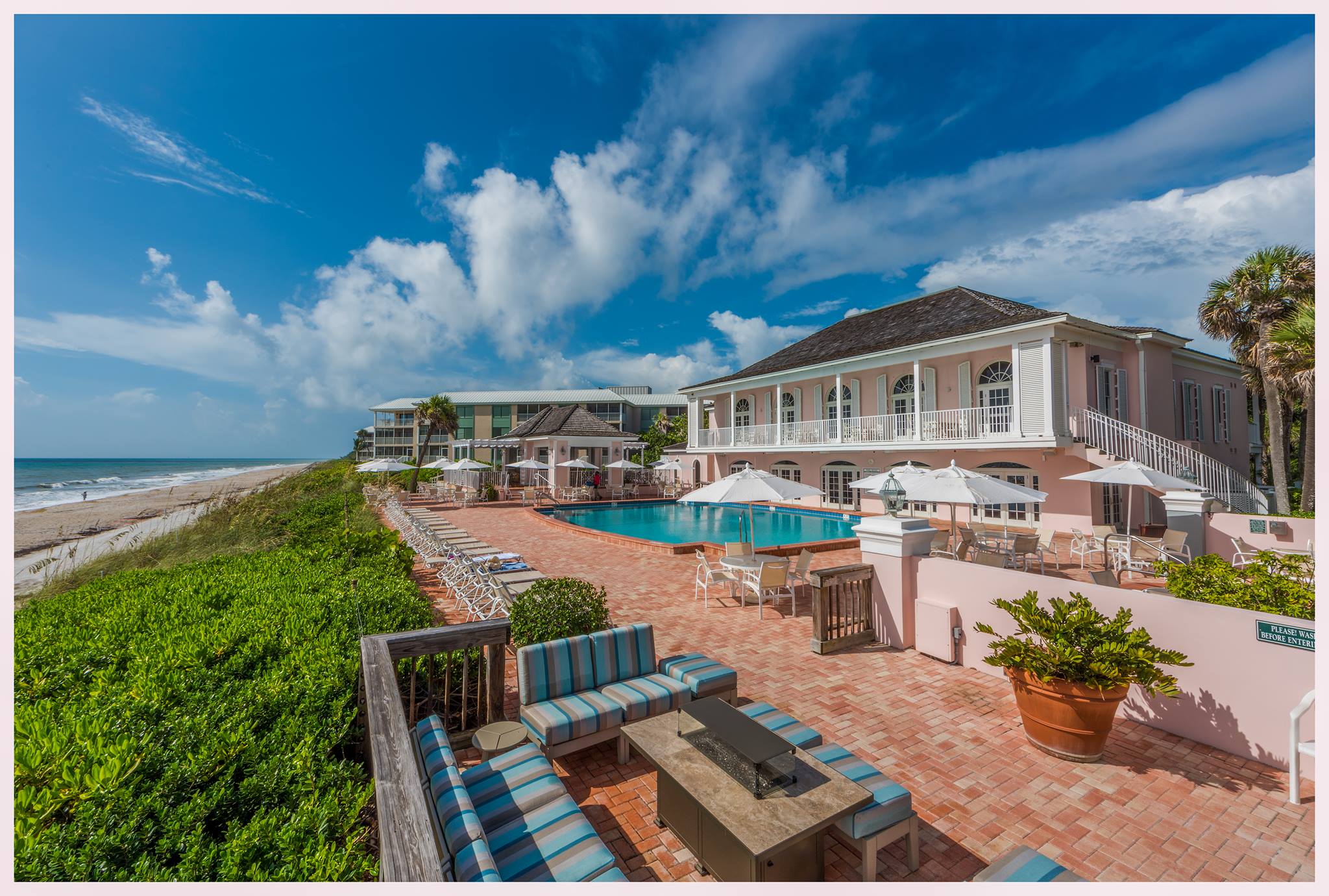 Oceanfront beach club with pool and clubhouse on the Vero Beach barrier island — private Atlantic beach access in a luxury community