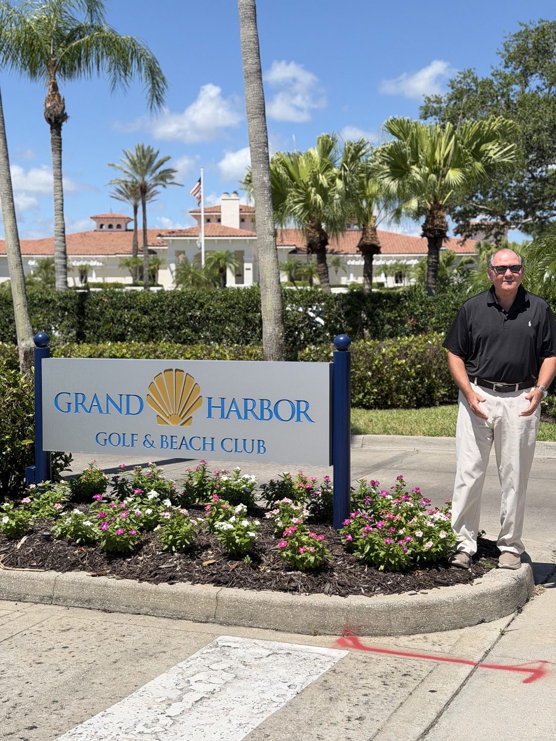 Entrance sign and clubhouse at Grand Harbor Golf and Beach Club on the mainland in Vero Beach, Florida